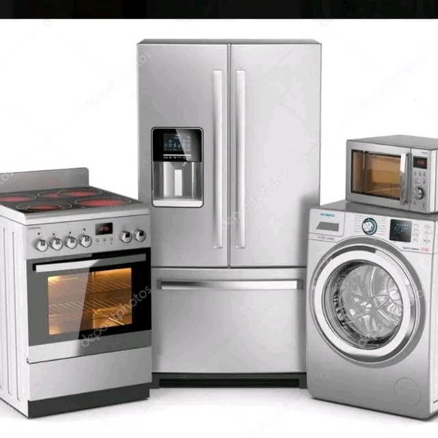 Technician repairing a fridge